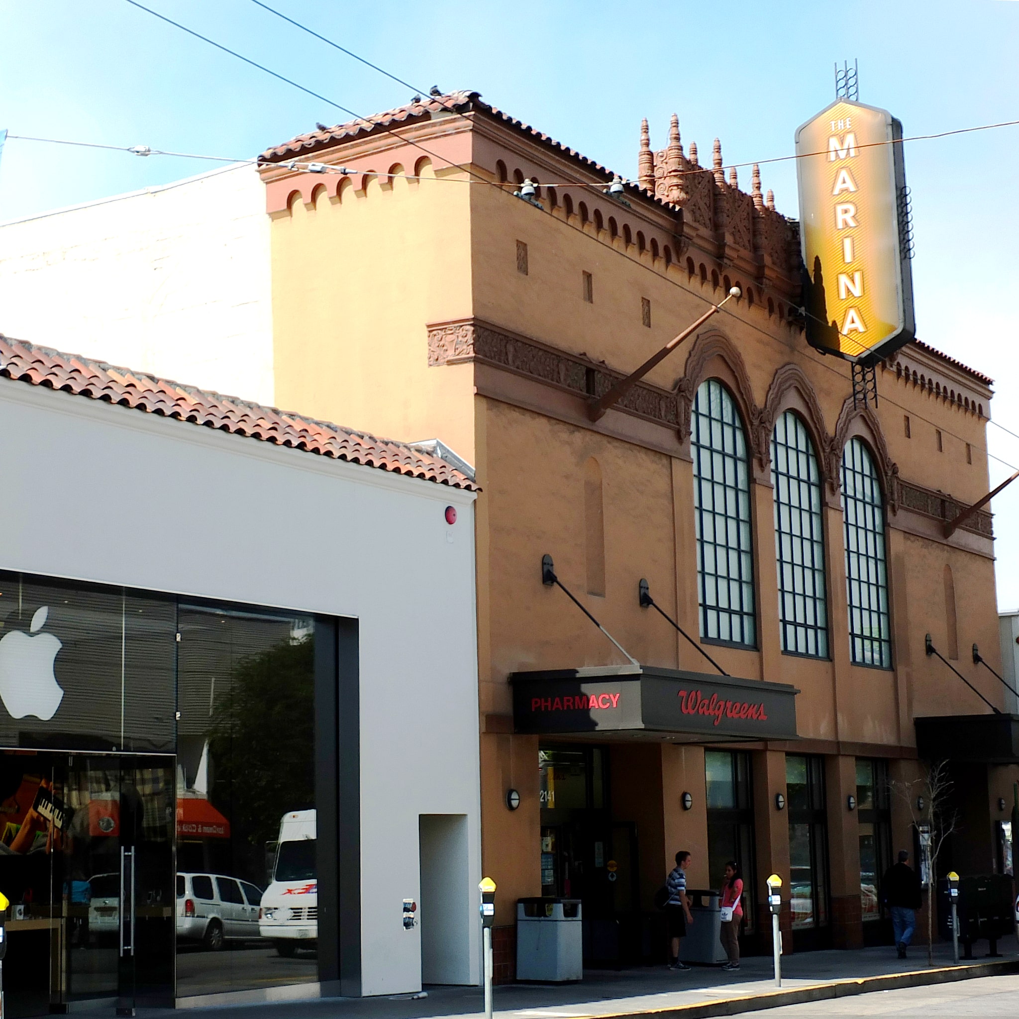 Exterior of Marina Theater with integrated Walgreens and Apple Store